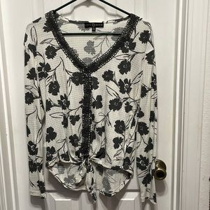 Off white with gray flowers too. Size S